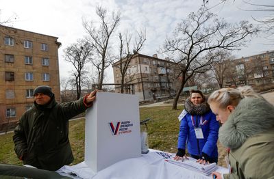 At gunpoint, Ukrainians in occupied regions vote in Russia’s election