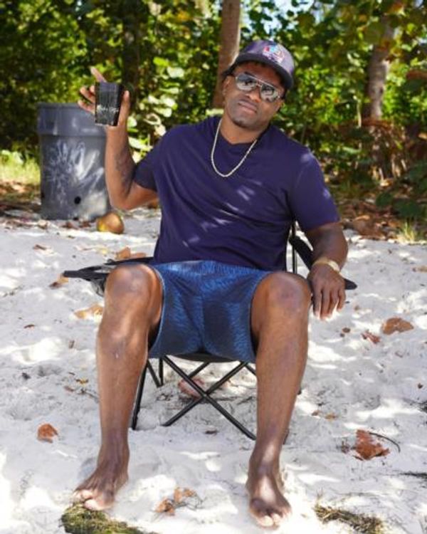 Edgerrin James Embraces Serenity: Beach Moments Captured In Photos