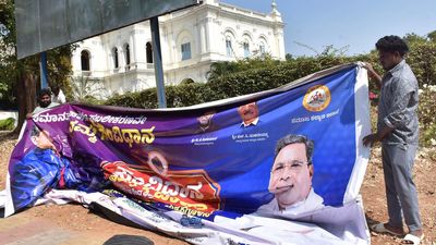 Posters, flexed pulled down; political representatives told to adhere to model code of conduct