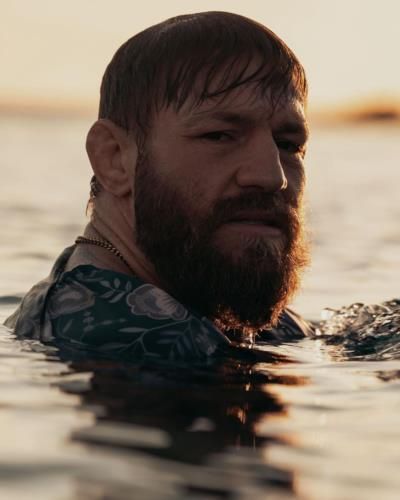 Conor Mcgregor Embracing A Refreshing Moment In The Water