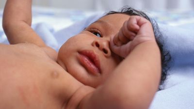 Why do babies rub their eyes when they're tired?