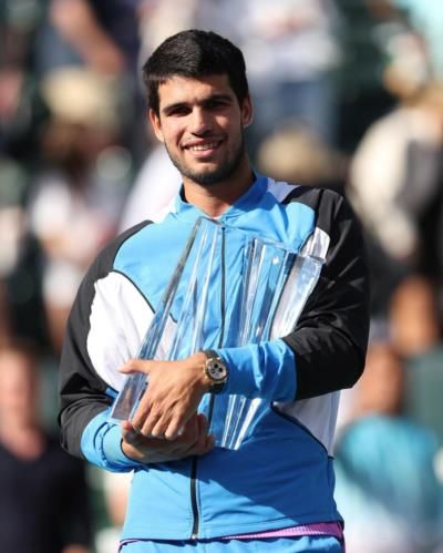 Carlos Alcaraz: Rising Tennis Star Triumphs With Historic Victory