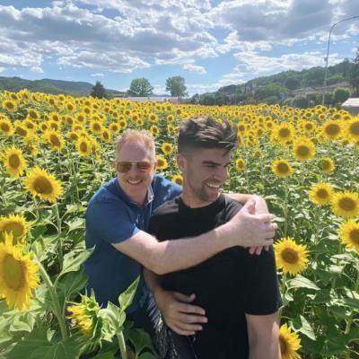 Radiant Love: Jesse Tyler Ferguson And Justin Mikita In Sunflowers