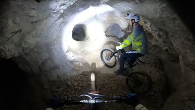 Mountain bikers ride abandoned mine shaft in the most insane MTB descent ever