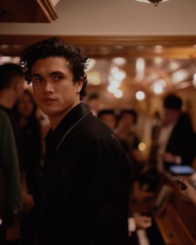 Charles Melton's Cool Sophistication: A Rugged Charm In Black
