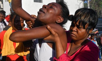 At least a dozen dead as gang violence spills into wealthy areas of Haiti capital