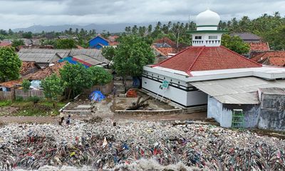 Indonesia fishing village flooded with tide of rubbish after heavy rains