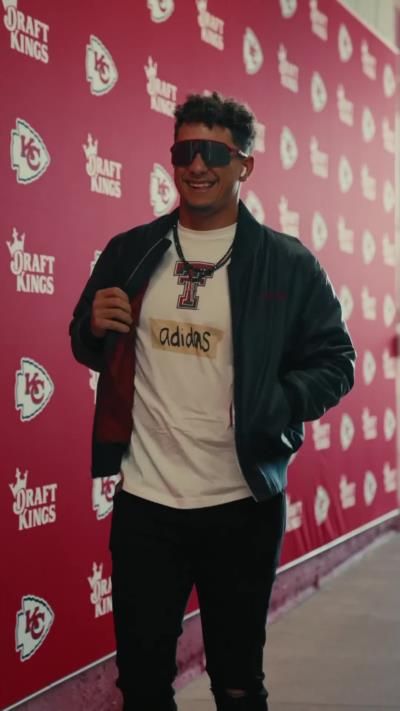 Patrick Mahomes Celebrates Victory With Trophy And Smiles