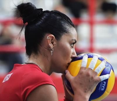 Julieta Nizetich Embracing A Volleyball In A Tender Moment