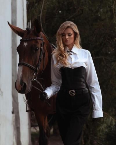 Elegant Black And White Fashion With Majestic Horse Pose