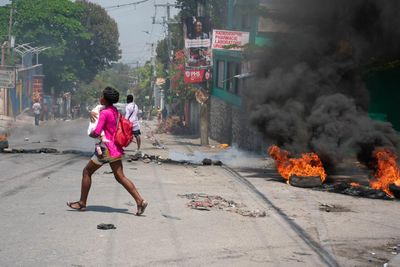 US starts to helicopter citizens out of Haiti as fighting erupts in wealthy areas
