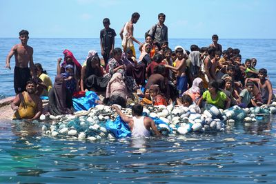 At least 69 Rohingya refugees rescued after boat capsizes off Indonesia