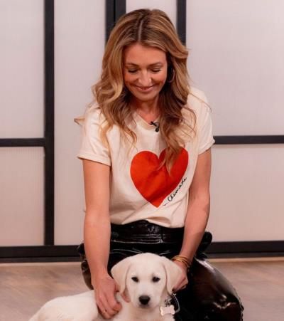 Cat Deeley Radiates Joy In Heart Print Tee And Black Pants