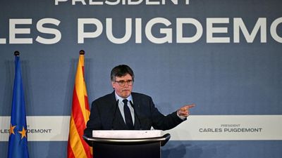 Fugitive Catalan chief Puigdemont pledges to return to Spain if he can be restored to power