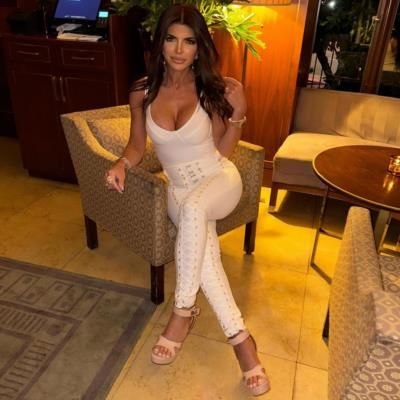 Teresa Giudice Radiates Timeless Elegance In White Dress Pose