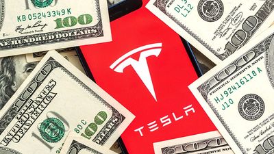 Dow Jones Futures Fall; FedEx Soars, Tesla Skids On China Production Cut