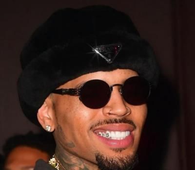 Chris Brown Rocks Stylish Beanie And Glasses With Bright Smile
