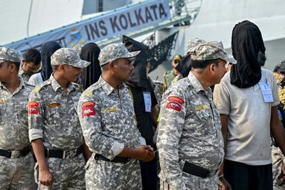 35 Somalis Arrive In India To Face Trial Over Ship Hijacking