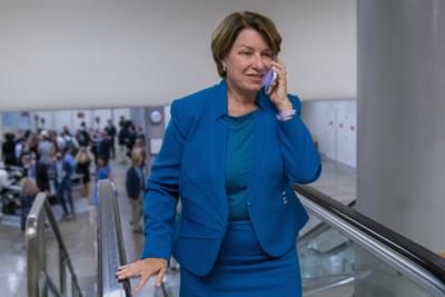 Sen. Klobuchar Faces Backlash For Government Spending Bill Celebration