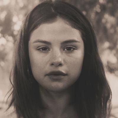 Selena Gomez Shares Captivating Throwback Picture Radiating Youthful Joy
