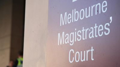 Man charged with murder over body found in street