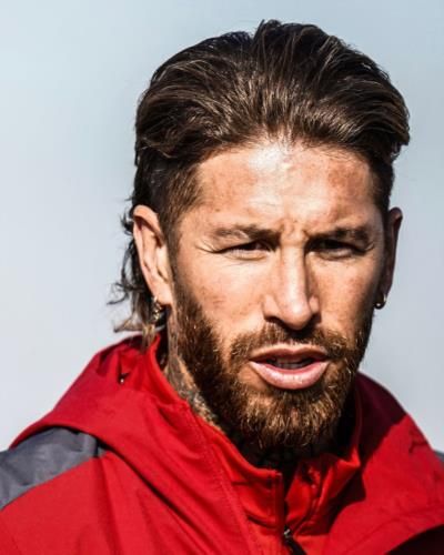 Sergio Ramos Radiates Confidence In Stylish Red Jacket Pose