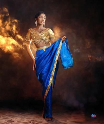 Elegant Beauty: Issie Princesse In Golden And Blue Saree