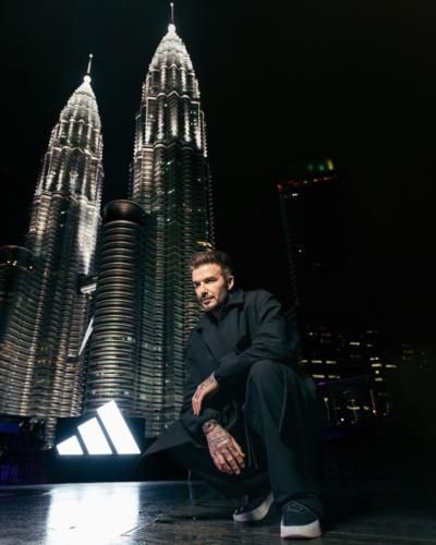David Beckham's Urban Sophistication: A Nighttime Pose