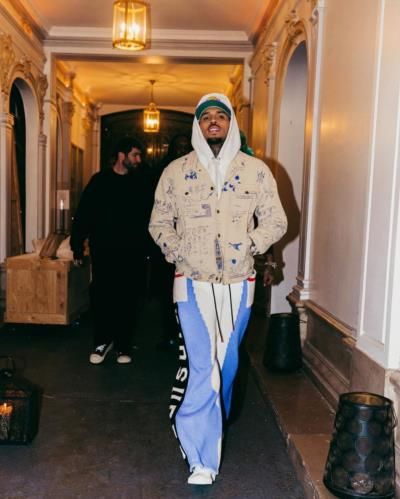 Chris Brown Showcases Fashion In Trendy White Hoodie Photoshoot