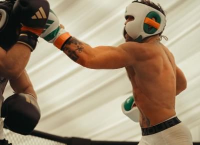 Conor Mcgregor Displays Boxing Prowess In Stylish White Outfit