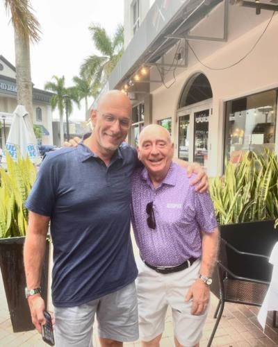 Celebrating Friendship: Dick Vitale And Friend In Casual Style
