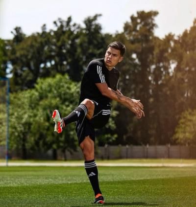 Elegance And Confidence: Paulo Dybala's Serene Pose On Greens