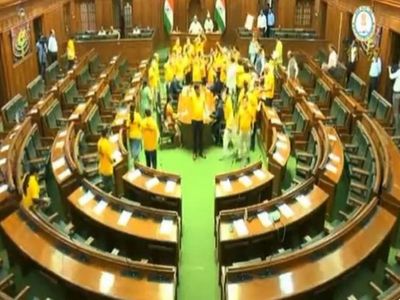 AAP MLAs don 'Mai Bhi Kejriwal' yellow T shirts in Delhi Assembly as they protest Chief Minister's arrest