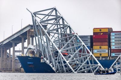 Baltimore bridge collapse: two bodies recovered from water, officials say