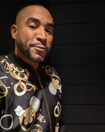 Don Omar Stuns In Sophisticated All-Black Ensemble