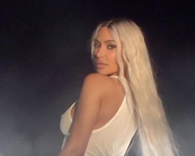 Kim Kardashian Radiates Elegance In Stylish White Top Ensemble