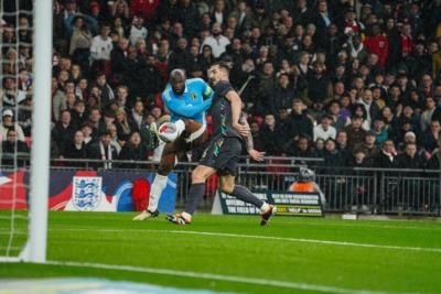 Romelu Lukaku Leading Team Unity And Determination On Football Field