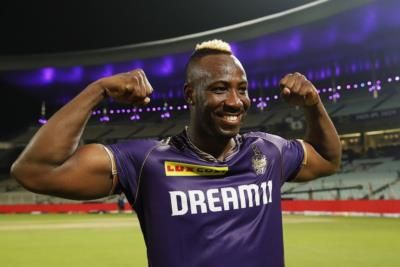 Andre Russell: Dominating The Field In Purple