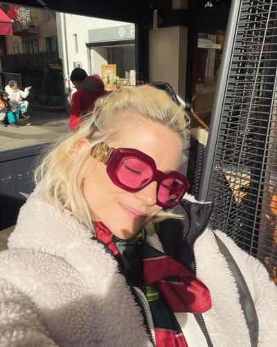 Pixie Lott Stuns In White Jacket And Maroon Glasses