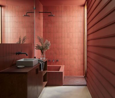 Red is the Unexpected Bathroom Color Trend of the Moment — And These Designers Say It's Better Than Beige