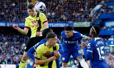 Dara O’Shea rescues point for 10-man Burnley at Chelsea after Palmer double