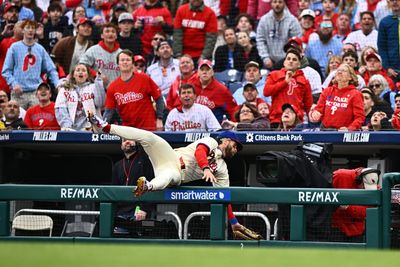 Bryce Harper accidentally cartwheeled into the dugout while going for a foul ball