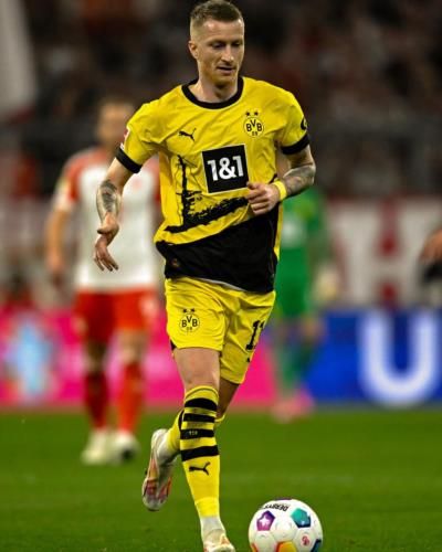 Marco Reus: Dynamic Performance Captured In Triumph
