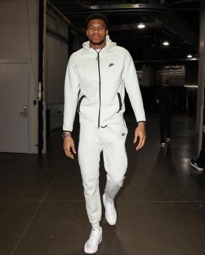 Giannis Antetokounmpo Captivating In Pure White Elegance