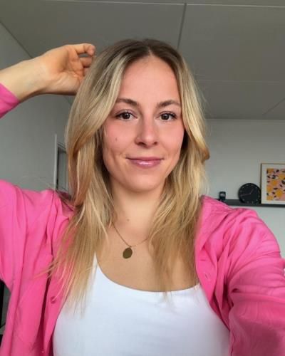 Mia Blichfeldt: Embracing Feminine Grace In Pink And White