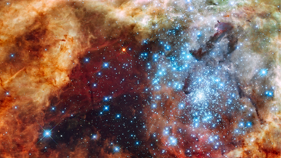 Hubble Space Telescope finds bucket of cosmic Easter eggs — 500 blue and red stars