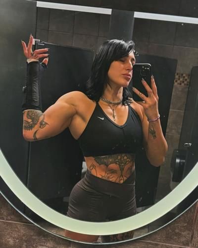 Rhea Ripley's Bold And Stylish Mirror Selfie