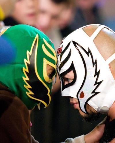 Exploring Rey Mysterio's Iconic Wrestling Costumes And Dynamic Presence