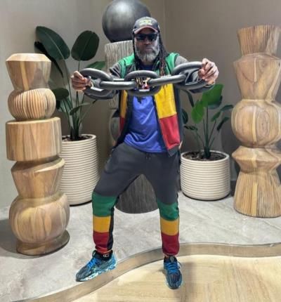 Chris Gayle Showcasing Vibrant Style And Charisma In Colorful Outfit