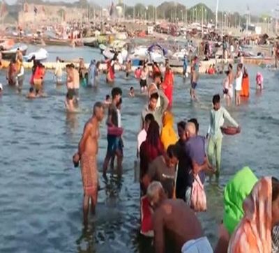 Devotees take holy dip at Triveni Sangam on Sheetala Ashtami